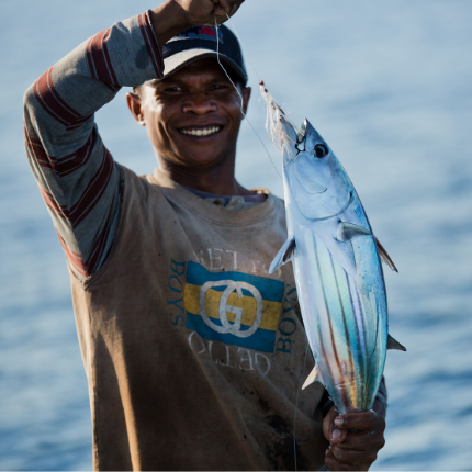 Man holding tuna in the Maldives